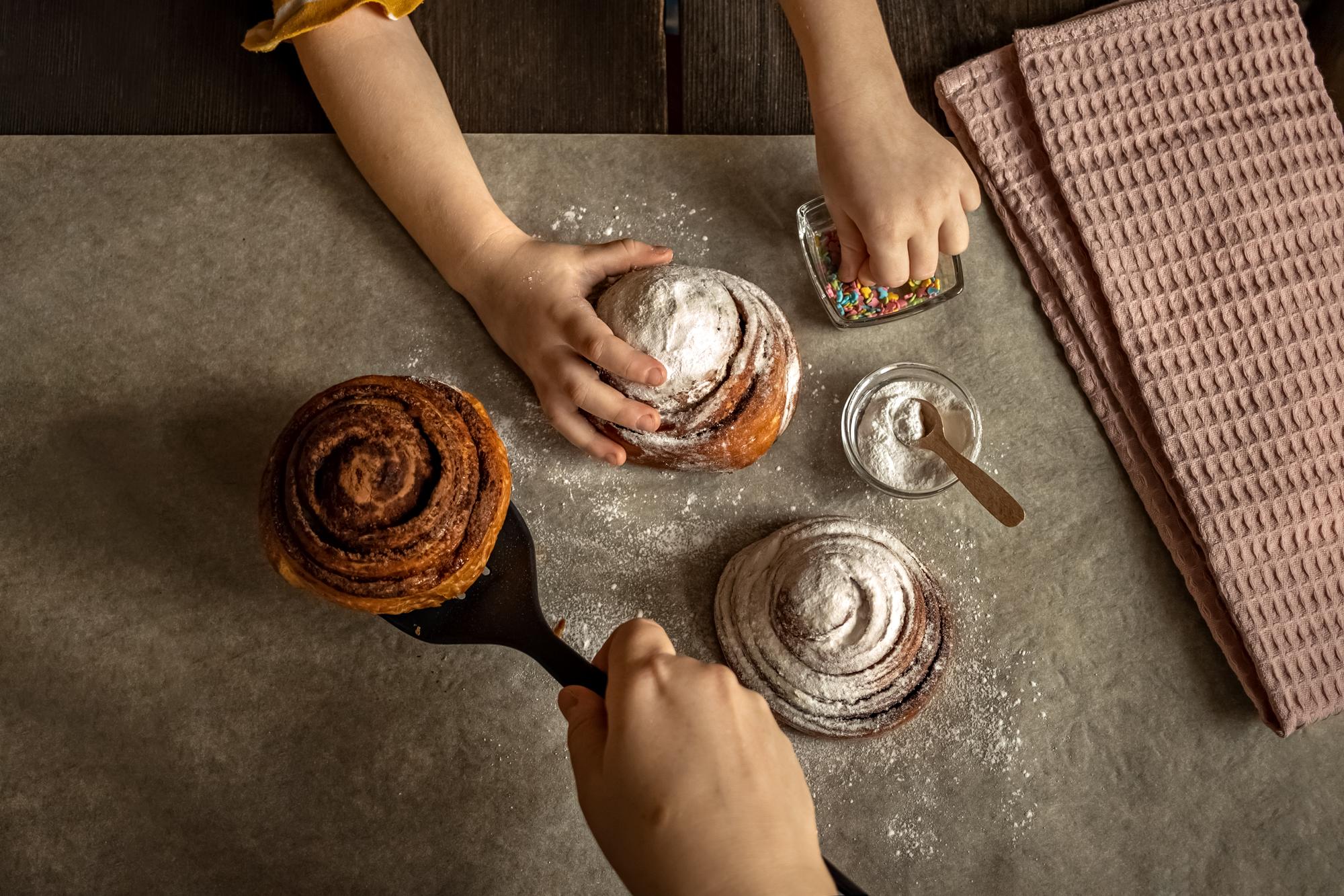 hands kneading fine pastry in a boutique kitchen